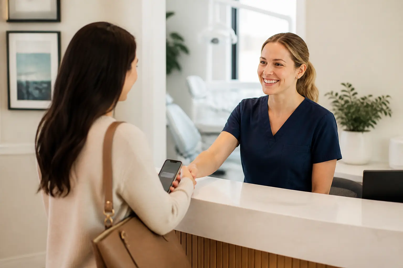 Dental professional welcoming a patient at a modern practice